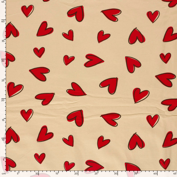 French Terry tissu cœurs Beige
