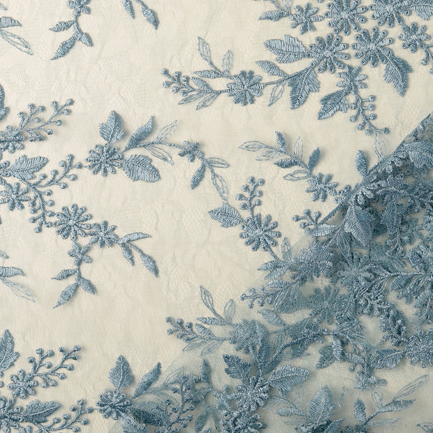 Dentelle tissu Bleu clair brodé avec bordure 